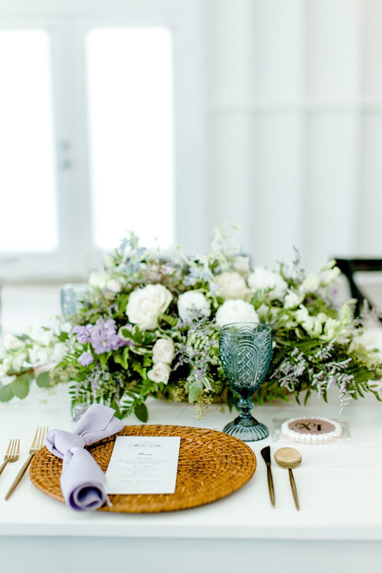A talented wedding florist creating a breathtaking bouquet with a mix of seasonal blooms.