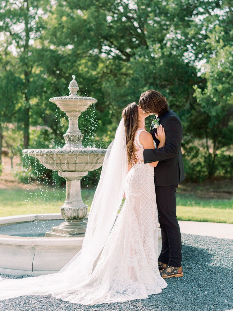 A stunning bride wearing a veil, creating a sense of timeless elegance.