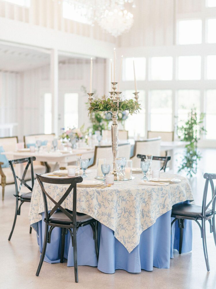 A vintage blue French country inspired wedding table.