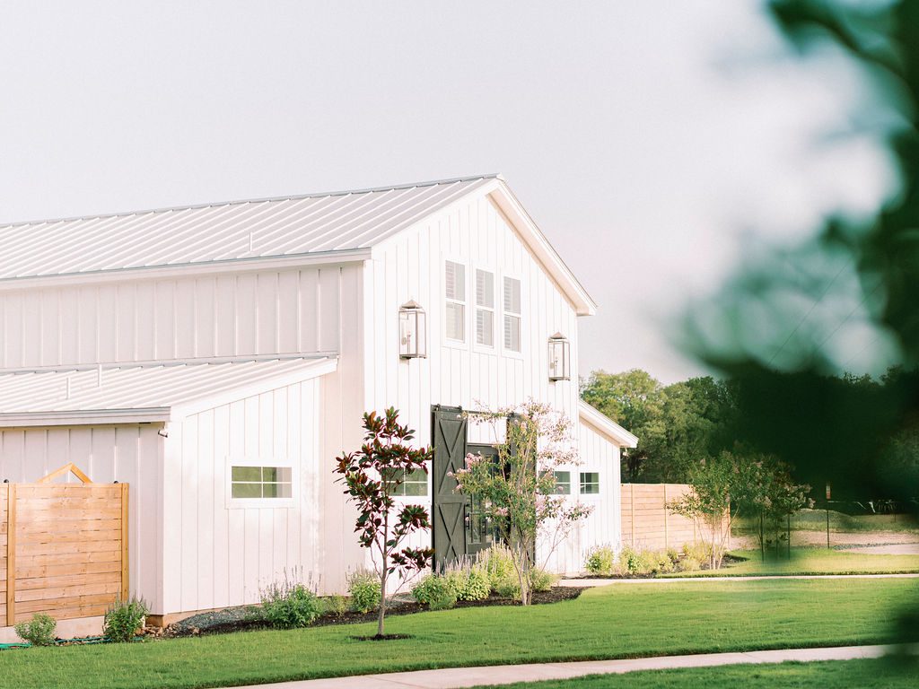 A charming outdoor/indoor wedding space with a country setting.