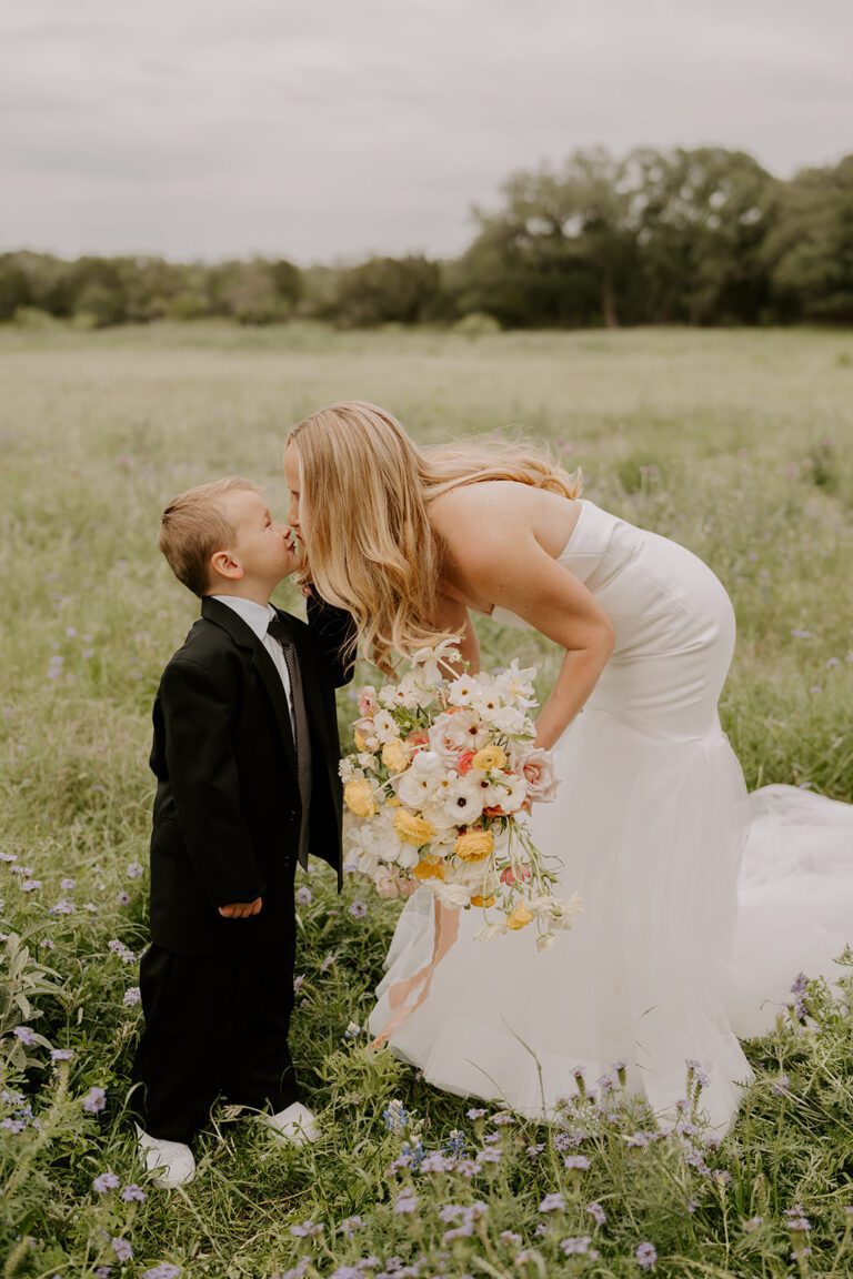 A breathtaking photo of a modern bride with her young son in Austin, Texas.