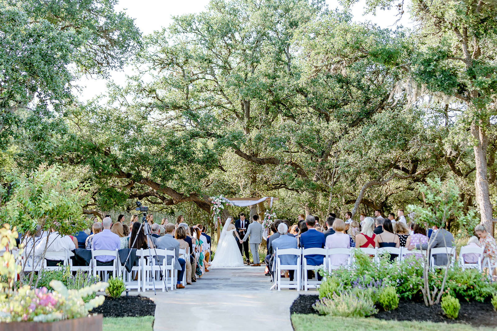 outdoor ceremony, canopy of trees, garden wedding